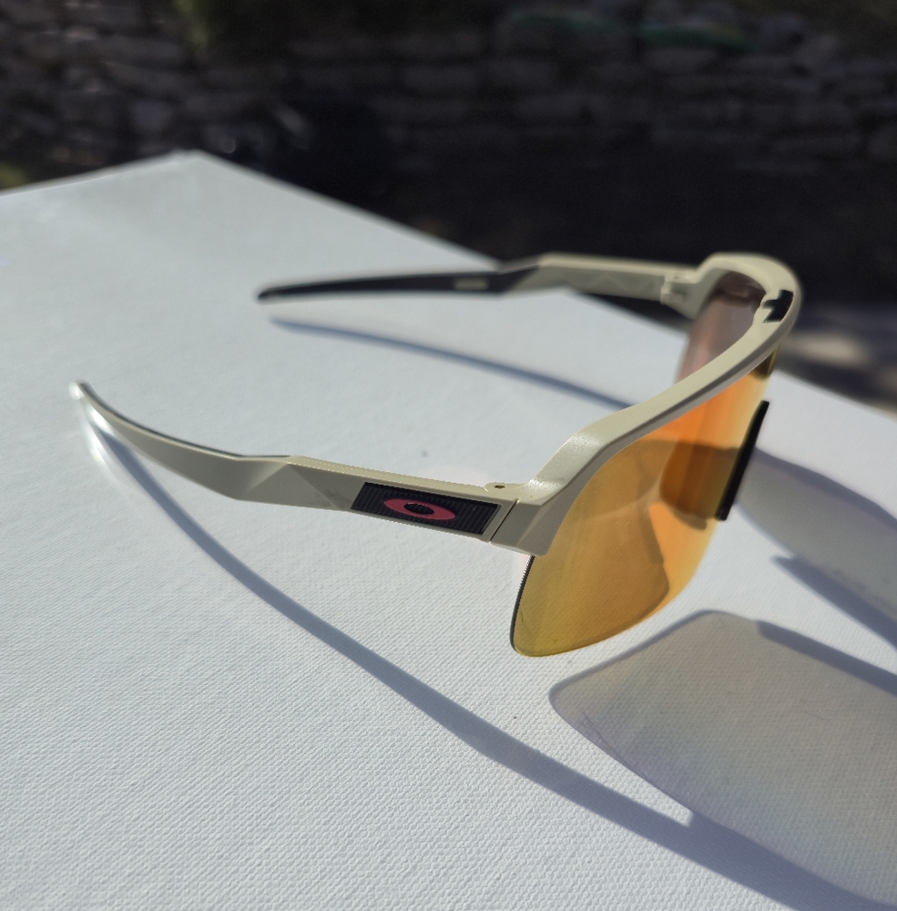 Oakley Sunglasses with Red Lens and Beige Accents - Picture 2 of 4